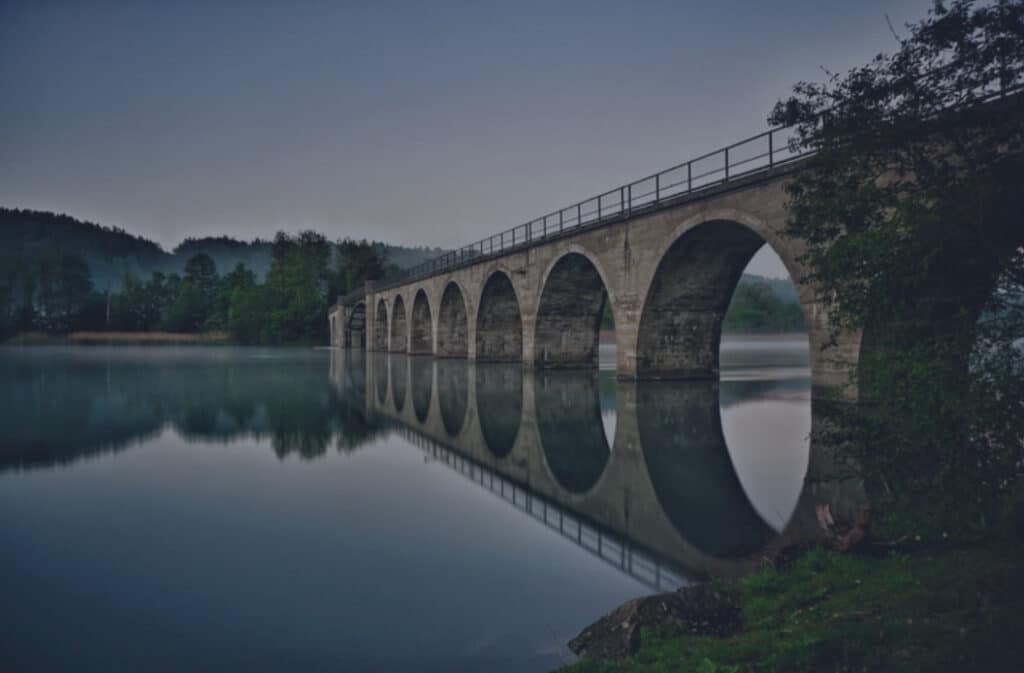 Header image for the blog The Matching Problem by Layan Faraj, with a bridge in the background symbolizing connection.