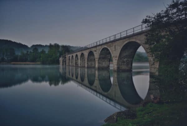Header image for the blog The Matching Problem by Layan Faraj, with a bridge in the background symbolizing connection.