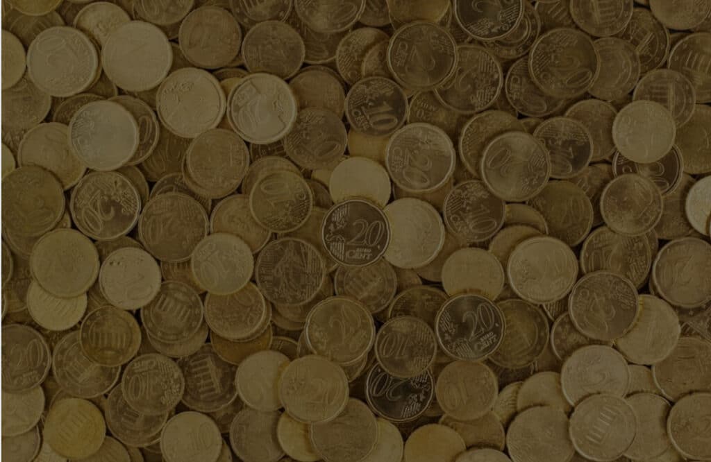 Header image for the blog "The Scalable Side Hustle: Build Once, Sell Thousands" by Layan Faraj, with a background of stacked coins.