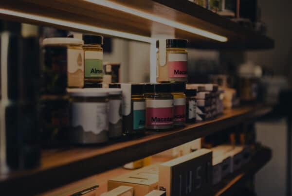 Header image for the blog “What Do We Mean By Innovative Products?” by Layan Faraj, showing shelves and jars.